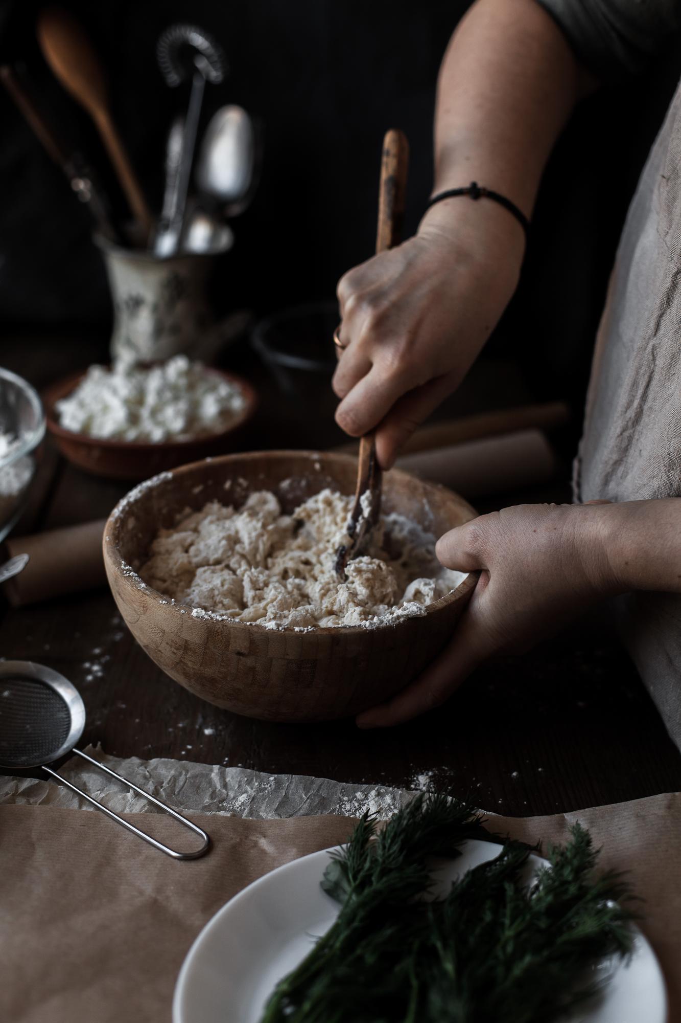 Artisan preparing dough by hand